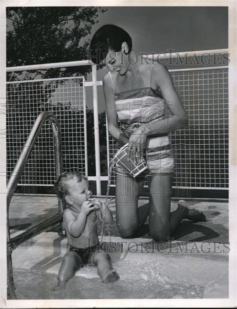 1952 Press Photo Hot Mom MILF In Bathing Suit Pours Water ...